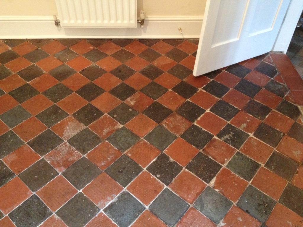 Black and Red Quarry Tiled Dining Room Before Cleaning in Shrewsbury