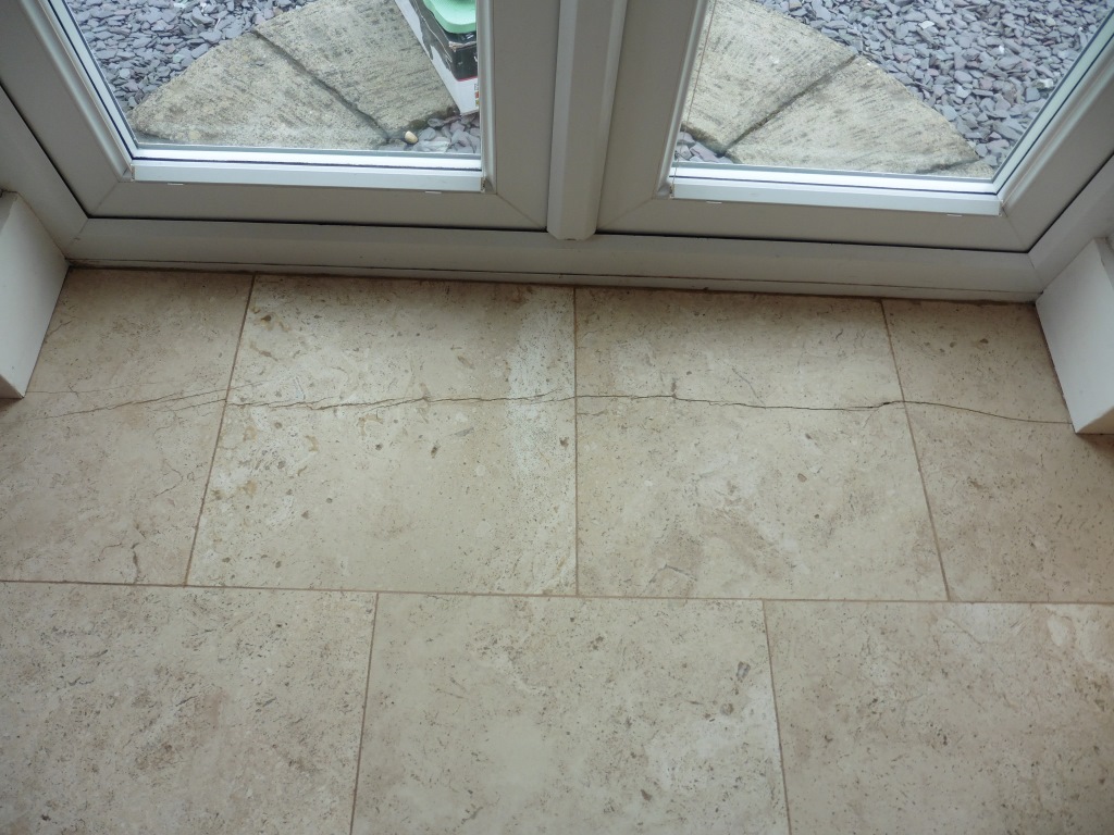 Cracked Travertine Tiles Before Repair in Worfield