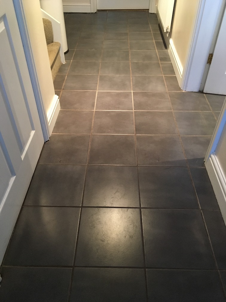 Ceramic Tiled Kitchen Floor Before Grout Cleaning in Childs Ecrall